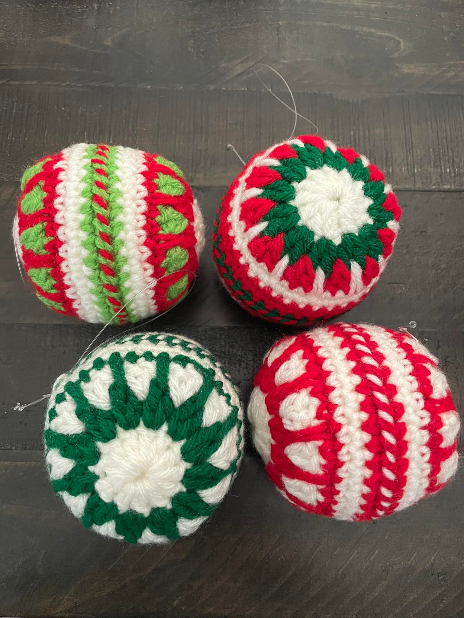 Some yarn spheres in Christmas colors.